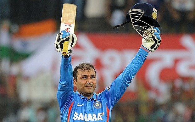 India opener Virender Sehwag sets new ODI record after scoring 219 against West Indies to overtake Tendulkar